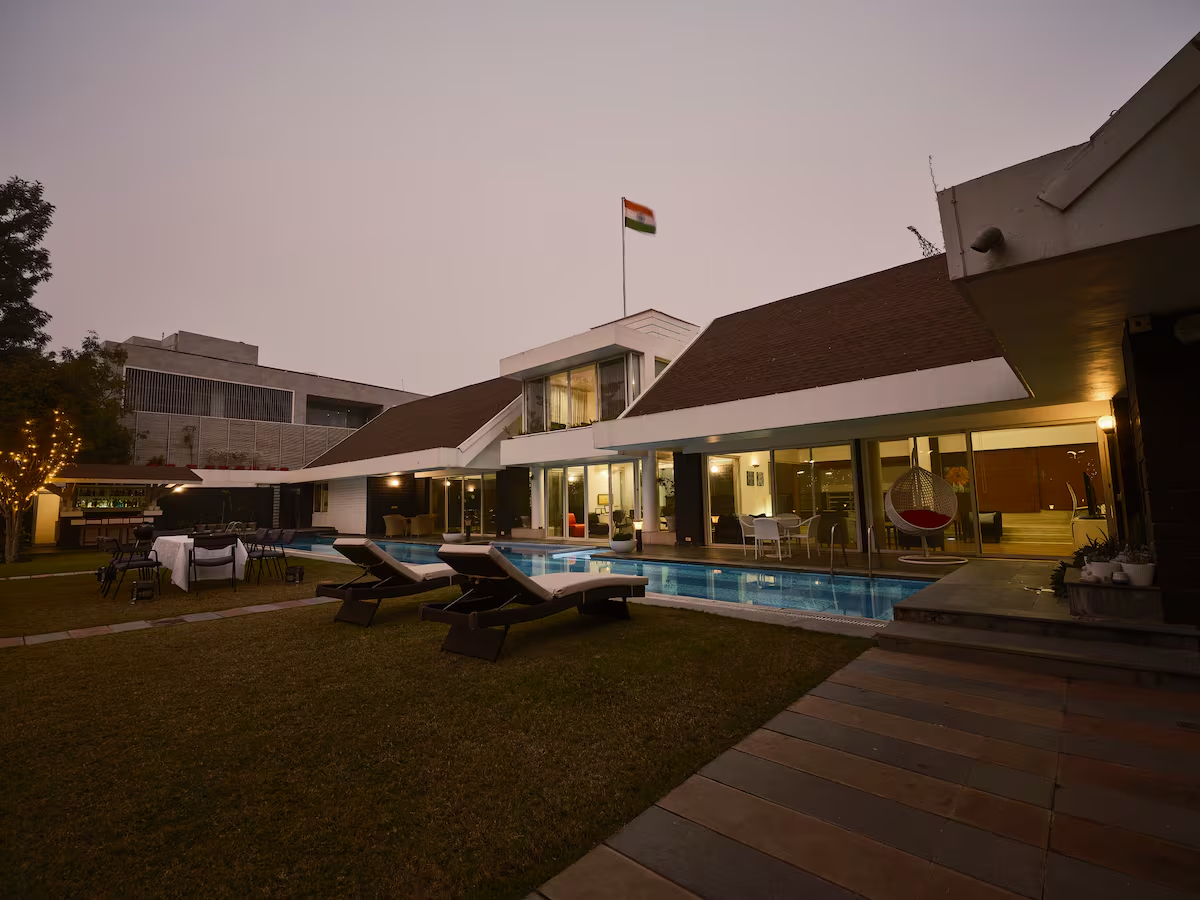 RB Villa - luxury private estate in Indore with full-length swimming pool and manicured gardens